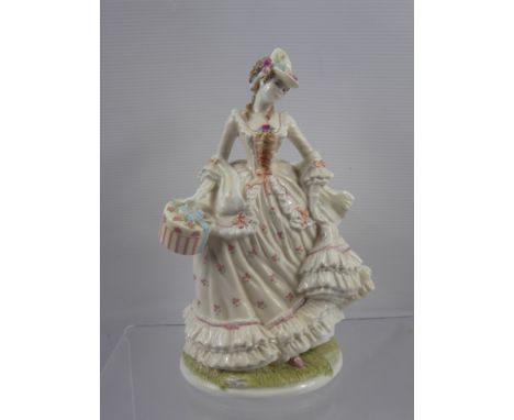 A Limited Edition Royal Worcester Figurine from the Song of Spring Series, entitled  'Follow the Sun' by Maureen Habon nr 573