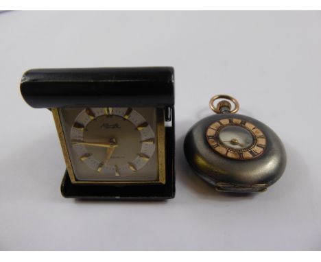 An Antique Gun Metal Gold Plated and Enamel Half Hunter, the watch having a minute dial with white enamel face and Roman nume