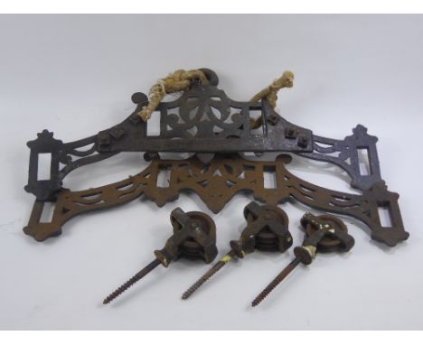 Kitchenalia, Large Vintage Drying Rack, with cast mounts and metal pulley system with a vintage measuring chain, foot lasts, 