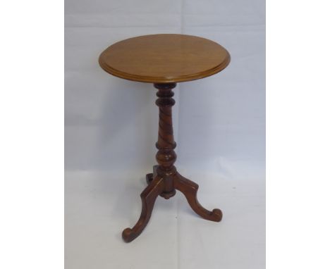 A Victorian Mahogany Wine Table, on twisted support with tripod base, approx 45 x 74 cms.