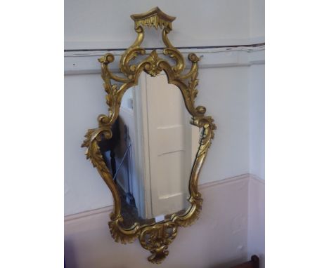 An Ornate Gilt Wood Hall Mirror, approx 100 x 54 cms.