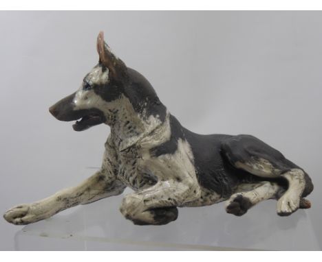 A Ceramic Sculpture of a Seated Alsatian, K. Pudge, approx 30 x 20 cms.