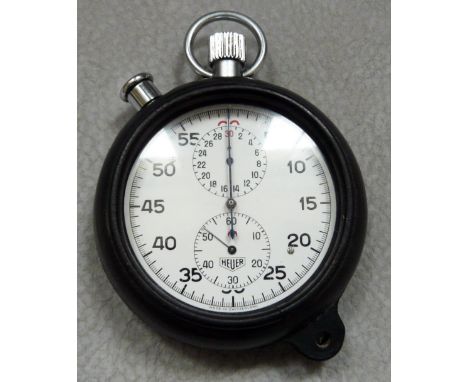 A Vintage Tag Heuer "Split Timer" Stop Watch, dating from the 1960's. complete with original rubber protective case.