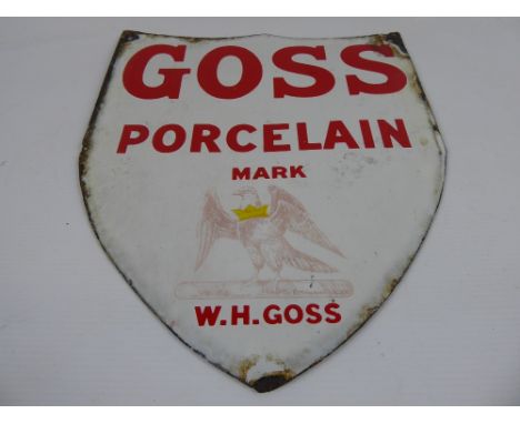 A Vintage Enamel Goss Porcelain Advertising Shield, the shield having the W. H. Goss logo, approx 26 x 30 cms.