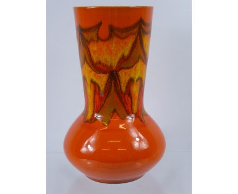 A Poole Pottery Vase, the vase having impressed marks to base, approx 84 AW and signed to base, approx 23 cms high.