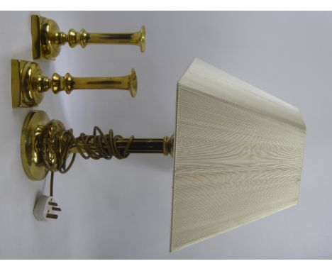 An Antique Brass Column Desk Light, together with a pair of brass candlesticks. (3)