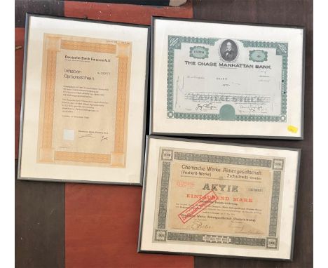 Three framed Share certificates. 