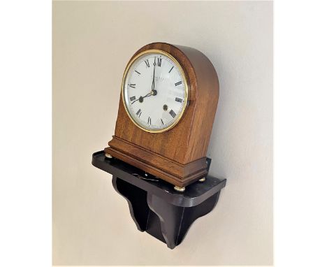 A Bracket Clock Circa 1920. Together with bracket. 