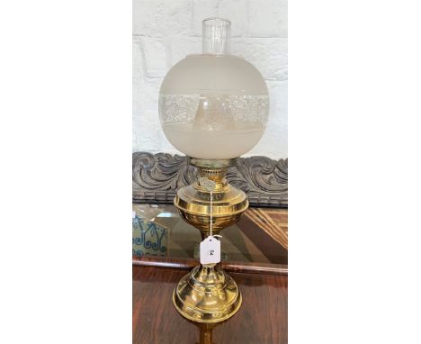 A Victorian Brass Oil Lamp. Complete with burner, shade and chimney. 