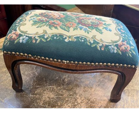 A Victorian Foot Stool. With tapestry top. Some damage to one leg. 