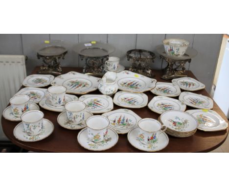 Tuscan China Tea-cups, Saucers, and Plates; Four Elkington Tazza Stands (only three glass dishes) 