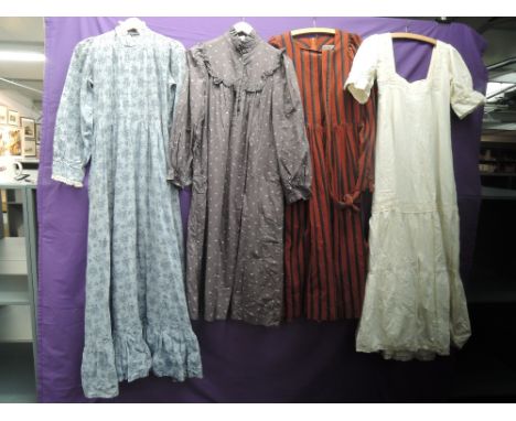 Four Vintage 1970s Laura Ashley dresses in Good condition, some age related marks. Small to medium sizes.
CONDITION REPORT
Go
