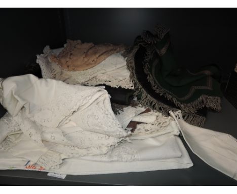 A lovely lot of vintage and antique table linens and similar, includes embroidered cloths, crotchet work cloths and a green w