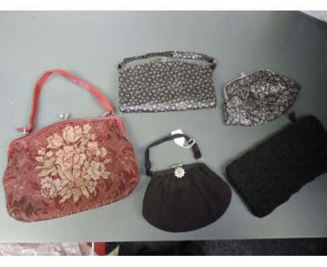 Five vintage handbags, around 1930s to late 50s. Various styles and sizes.
Good condition, strap needs reattactching to clasp