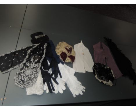 A collection of vintage and antique items, including two early bonnets/ caps having lace detailing, gloves,modesty panels, a 