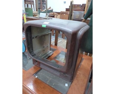 A BROWN BAKELITE TELEVISION CASE WITH INTERNAL SPEAKER