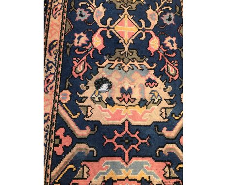 A VINTAGE TUFTED RUNNER OF OUSHAK DESIGN 380 x 120 cm's