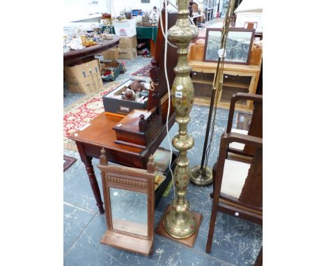 AN EDWARDIAN WALNUT SHELF MIRROR TOGETHER WITH A EASTERN BRASS FLOOR LAMP