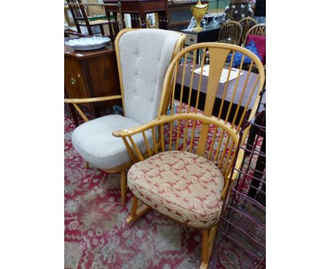 AN ERCOL STICK BACKED ROCKING CHAIR TOGETHER WITH AN ERCOL ARMCHAIR