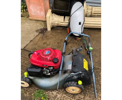 A HONDA ROTARY MOWER AND A PRESSURE WASHER