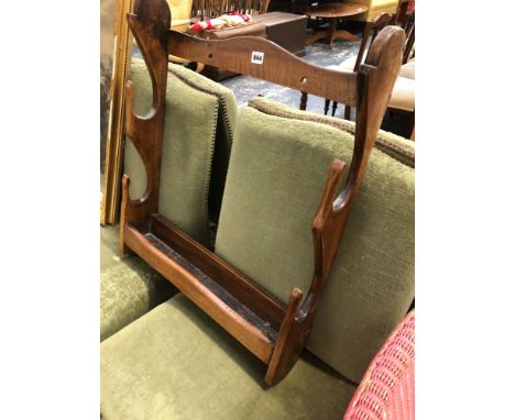 A VINTAGE COUNTRY MADE HANGING GUN RACK 