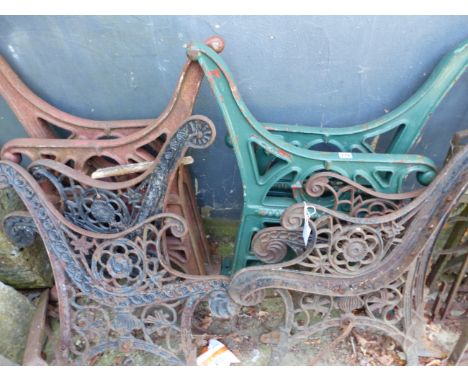 TWO PAIRS OF ANTIQUE CAST IRON RAILWAY TYPE BENCH ENDS AND TWO FURTHER PAIRS.