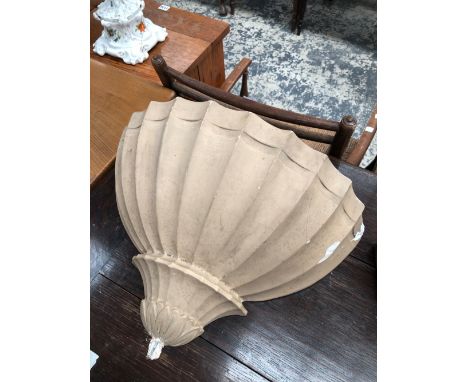 A PLASTER WALL LIGHT, THE EXTERIOR OF THE SHELL SHAPE FLUTED AND PAINTED IN OATMEAL
