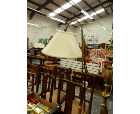 A VINTAGE STYLE BRASS FINISH ADJUSTABLE FLOOR LAMP