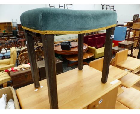 A VINTAGE LIMED OAK CORONATION STOOL POSSIBLY BY HEALS. 