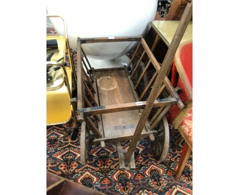 A VINTAGE PULL CART