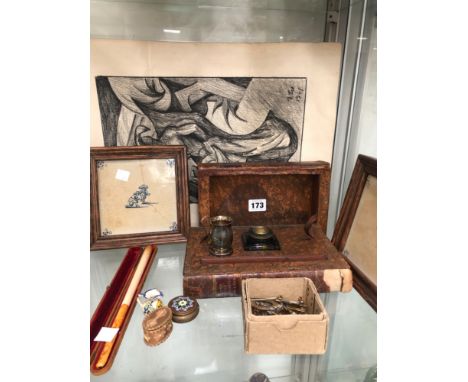 A VINTAGE INK STAND, FRAMED TILES, CHARCOAL&nbsp; DRAWINGS SIGNED AND DARTED 1961, CAP BADGES ETC