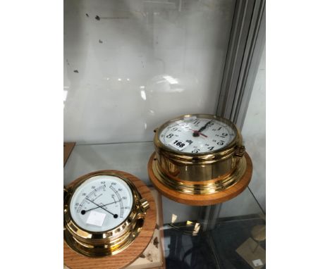 A RADIO MASTER SEWILLS LIVERPOOL SHIPS CLOCK TOGETHER WITH A SIMILAR THERMOMETER 