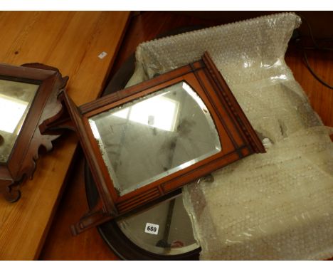 AN ANTIQUE INLAID HALL MIRROR WITH SHELF, A FRET CUT MIRROR AND TWO FURTHER WALL MIRRORS.