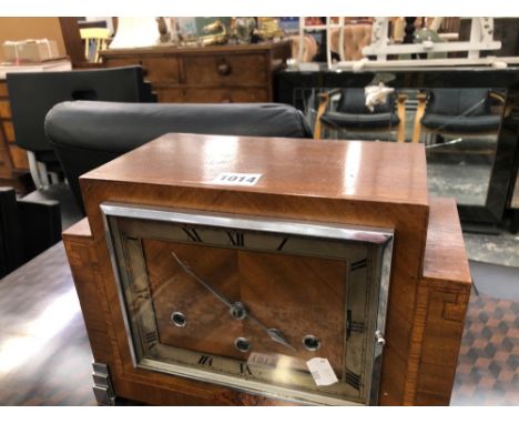 AN ART DECO MANTLE CLOCK
