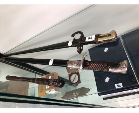 A MAUSER TYPE BAYONET, A 1877 PATTERN BAYONET AND A SHORT EASTERN SWORD STICK