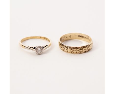 A diamond solitaire ring set in 18ct yellow gold and platinum, size I and a 9ct gold wedding band