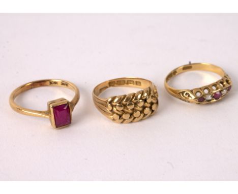 A ruby and diamond five-stone ring, set in 18ct yellow gold, size L½, an 18ct single stone ring and an 18ct gold ring with ro