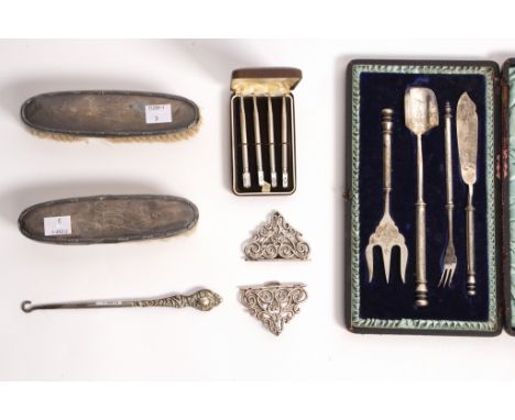 A set of four sterling silver bridge pencils, a nurse's buckle, HWC, London 1899, a plated set including a stilton scoop and 