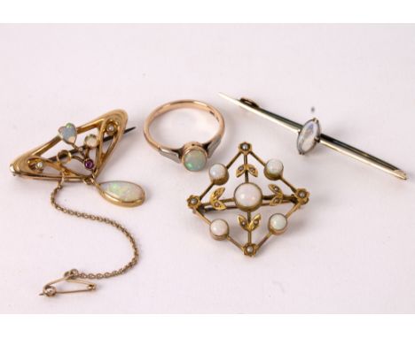 A group of opal set jewellery comprising an Art Nouveau brooch, another of square form, a bar brooch and a ring, some losses,