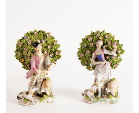 A pair of ceramic figures, piper with companion, 18cm high