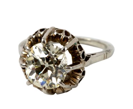 A solitaire diamond ring, the cushion shaped stone claw set to a white precious metal shank, size M/see illustration