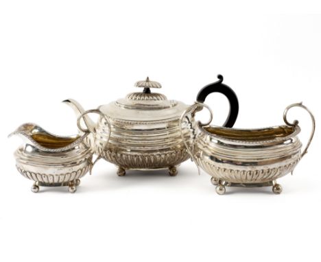 A George III silver tea service, Alice and George Burrows and others, London 1814, 1815 and 1818, half-ribbed and with a gadr
