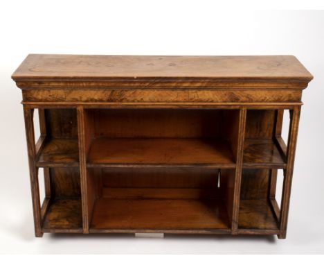 An early 20th Century olive wood hanging shelf with moulded cornice and fluted divisions, 80cm wide