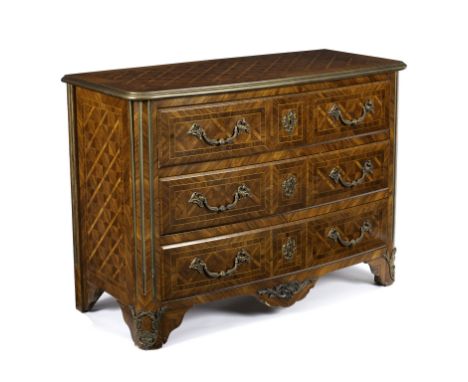 An Italian kingwood commode with ormolu mounts and handles, fitted three drawers on bracket feet, 117cm wide/see illustration