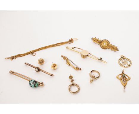 An Edwardian bar brooch of swagger stick form centred by a peaked cap, a 15ct bar brooch centred by a diamond, an Art Nouveau