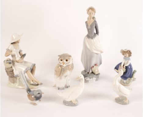 Seven Lladro and Nao figures