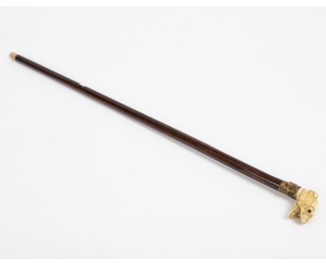 A rosewood walking stick with gilt copper collar and carved ivory bull mastiff handle/see illustration Condition Report: This