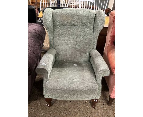 Button back wing armchair