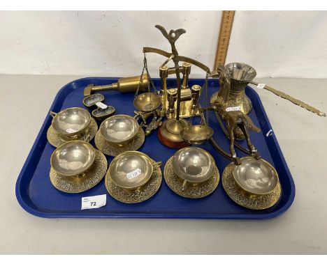 Tray of various assorted brass wares to include cups and saucers, beam scales, model rocking horse etc