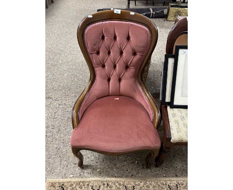 Pink upholstered button back chair